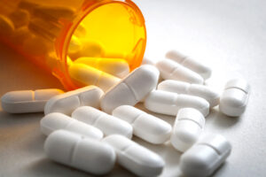 Close up of pills and prescription bottle